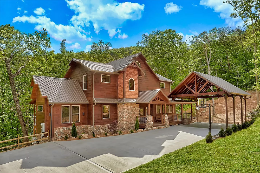 Custom home with stone accents and attached garage in Sevier County