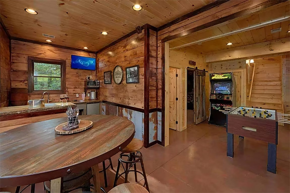 Custom kitchen with curved island and rustic wood cabinetry