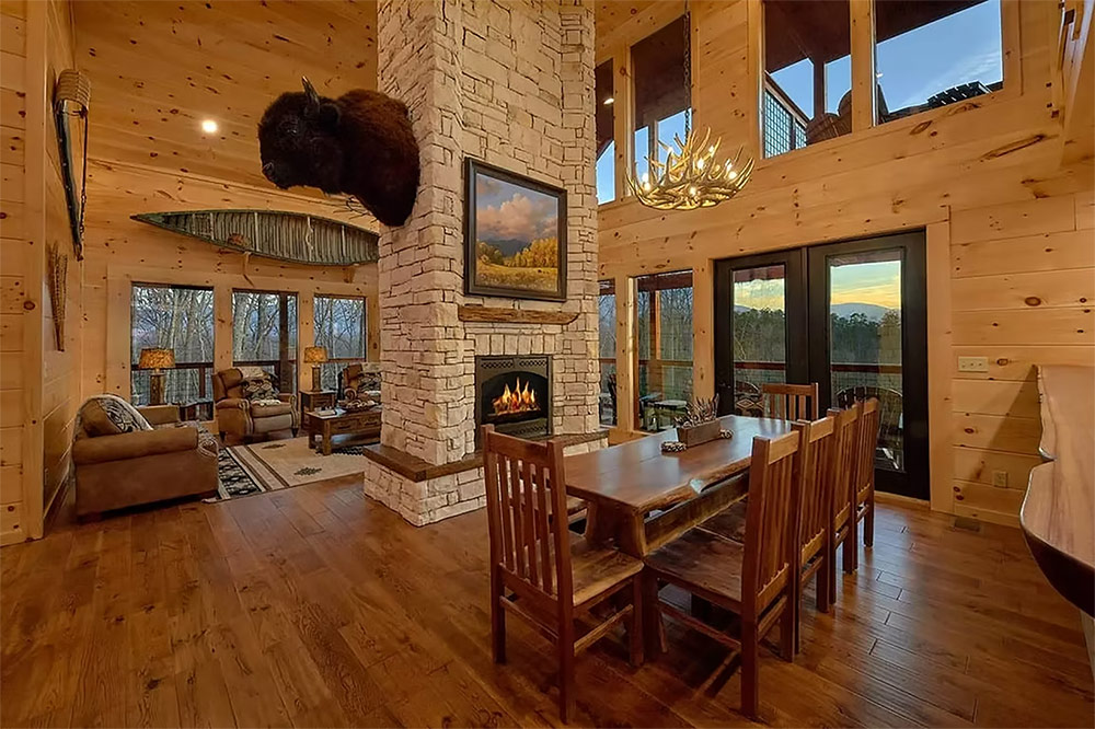 Spacious great room with dining area and floor-to-ceiling windows
