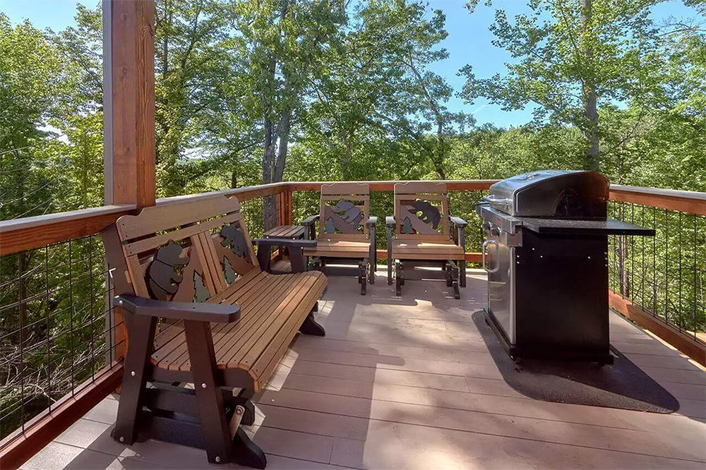 Outdoor deck with grilling area and comfortable seating