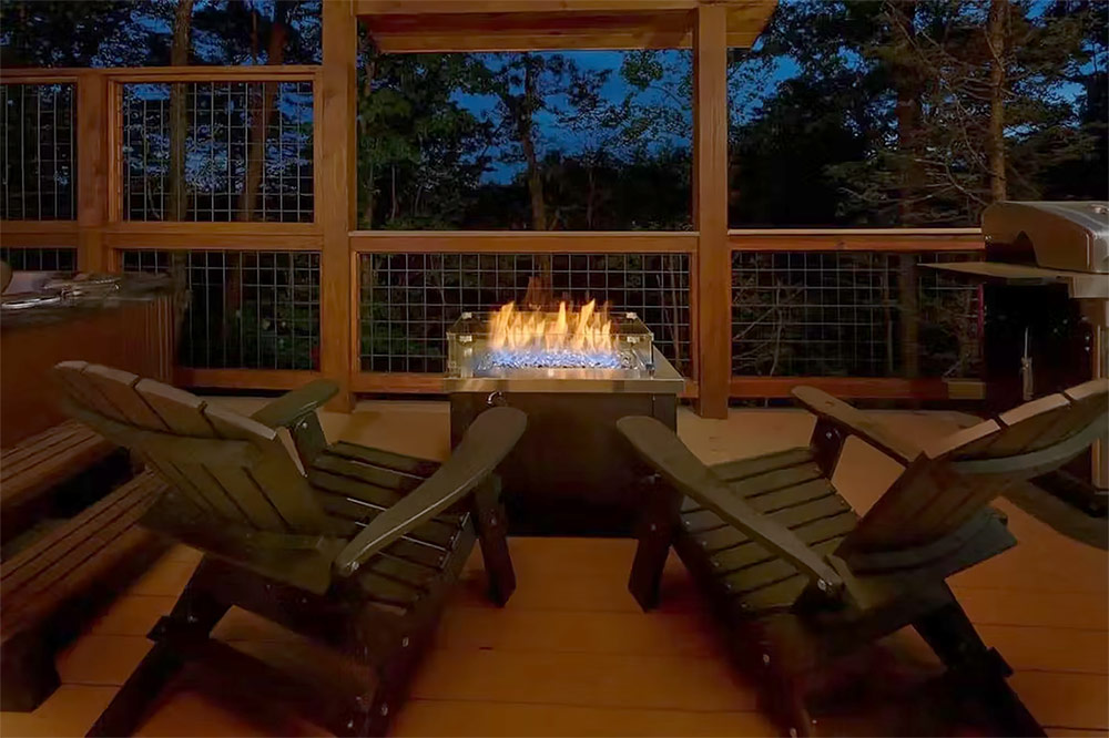 Covered deck with Adirondack chairs and fire feature