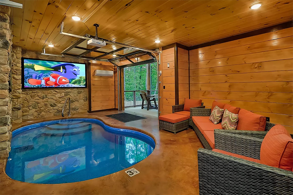 Private indoor pool with seating and entertainment area