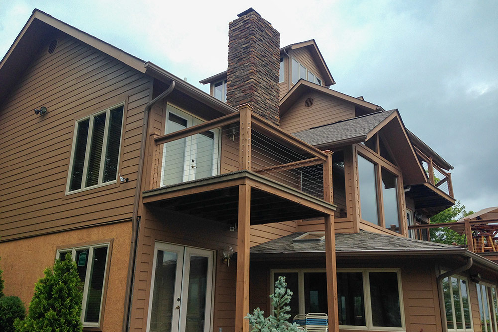 Large custom mountain home with multiple decks built by Smoky Mountain Builders