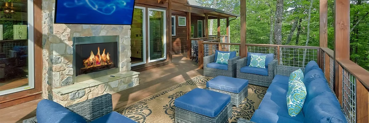 Outdoor deck with fireplace and comfortable seating